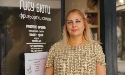 Amene Vasefi in front of her hair salon in Sofia