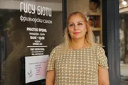Amene Vasefi in front of her hair salon in Sofia