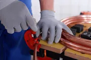 Craftsman cutting a pipe.jpg
